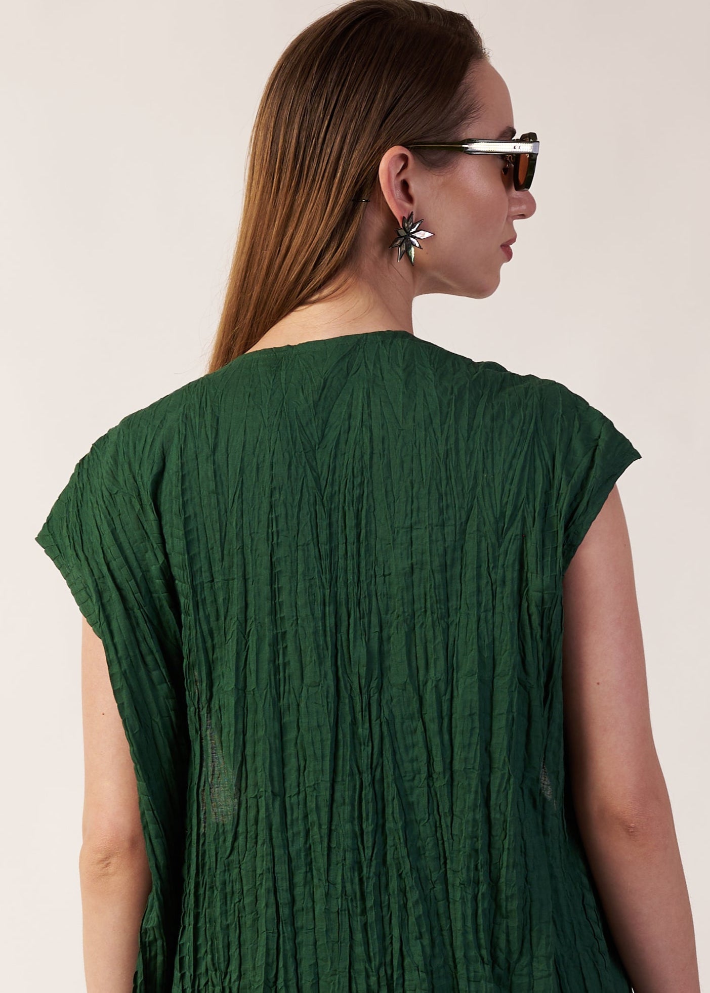 Woman wearing a dark green textured dress | Women's Overlay & Camisole | Jacket | Pret Clothes | nEo Clothes.