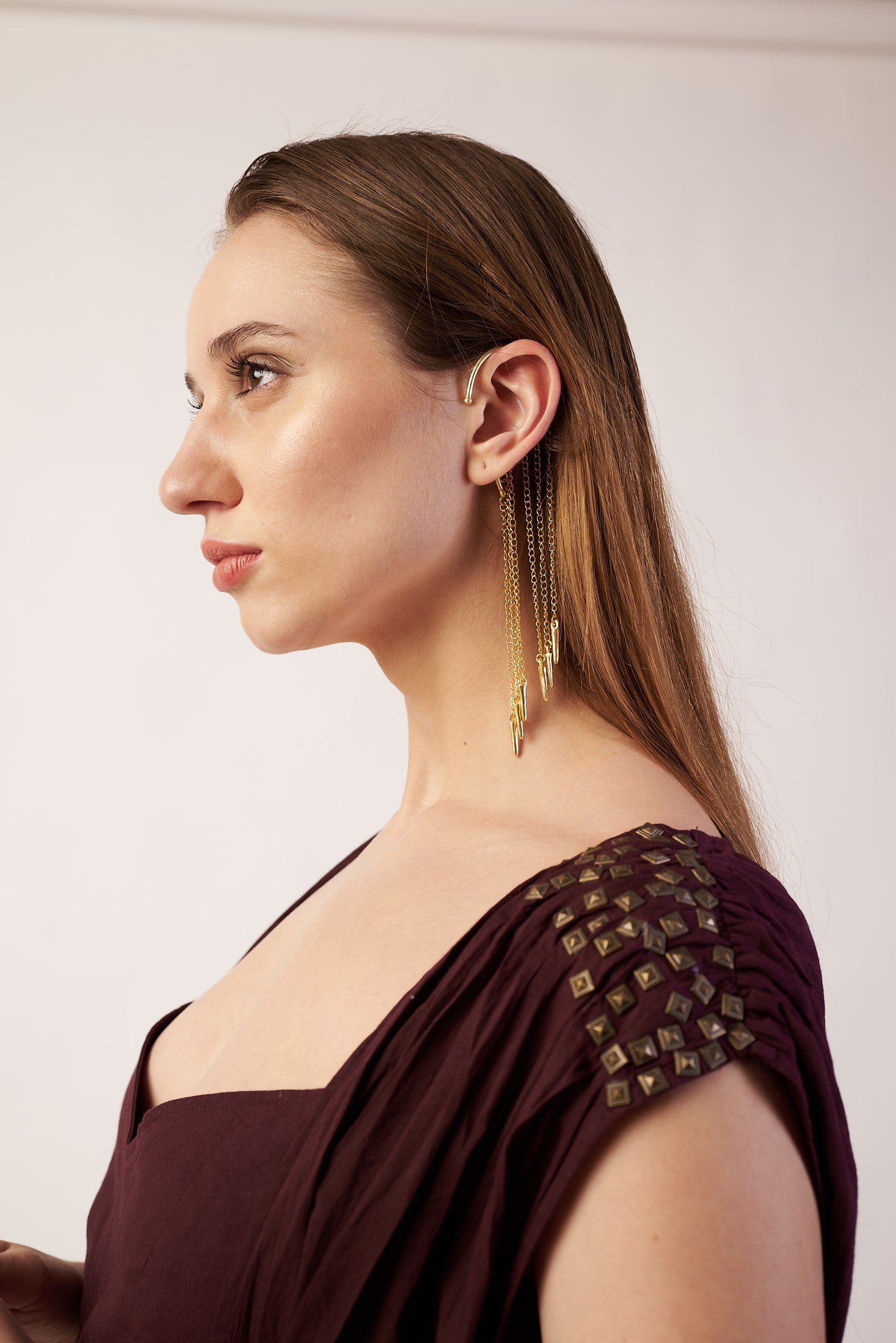 Woman wearing a Gold Ear Cuffs Earrings coca cola camisole with embellishments  | Statement Ear Cuffs | neo jewelry 
