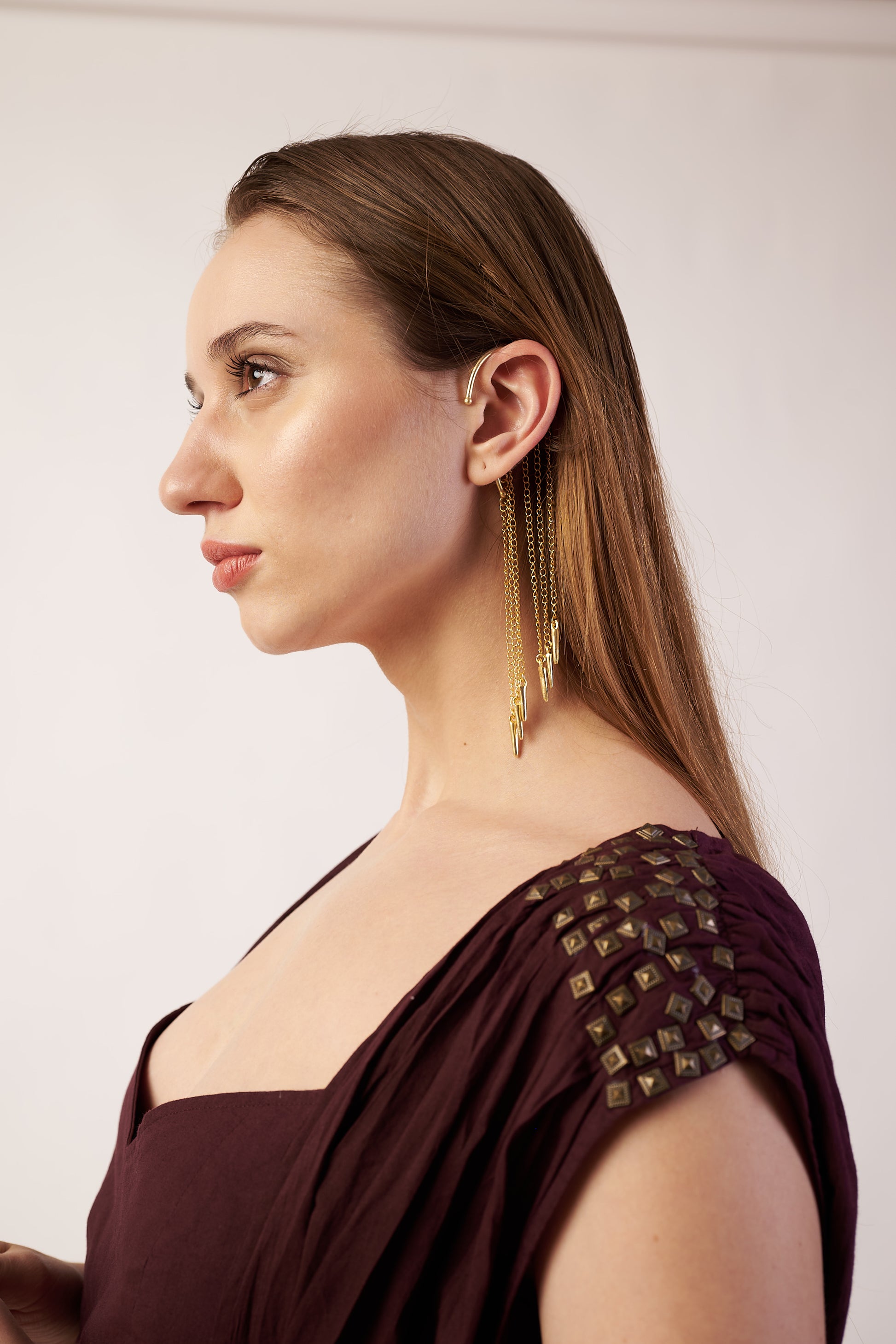 Woman wearing a Gold Ear Cuffs Earrings coca cola camisole with embellishments  | Statement Ear Cuffs | neo jewelry 
