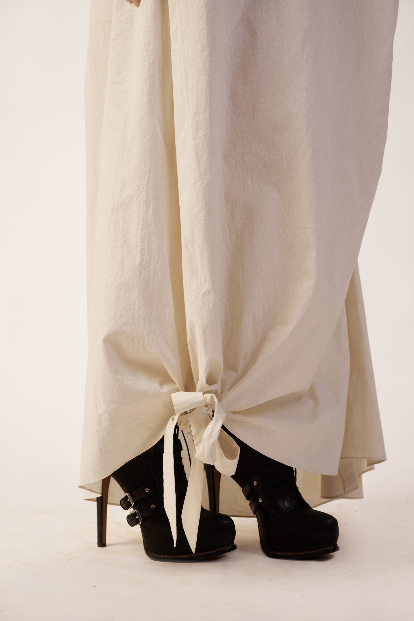 Black platform shoes with white ribbons worn with a long skirt  | Women Dresses | Pret Clothes | nEo Clothes.