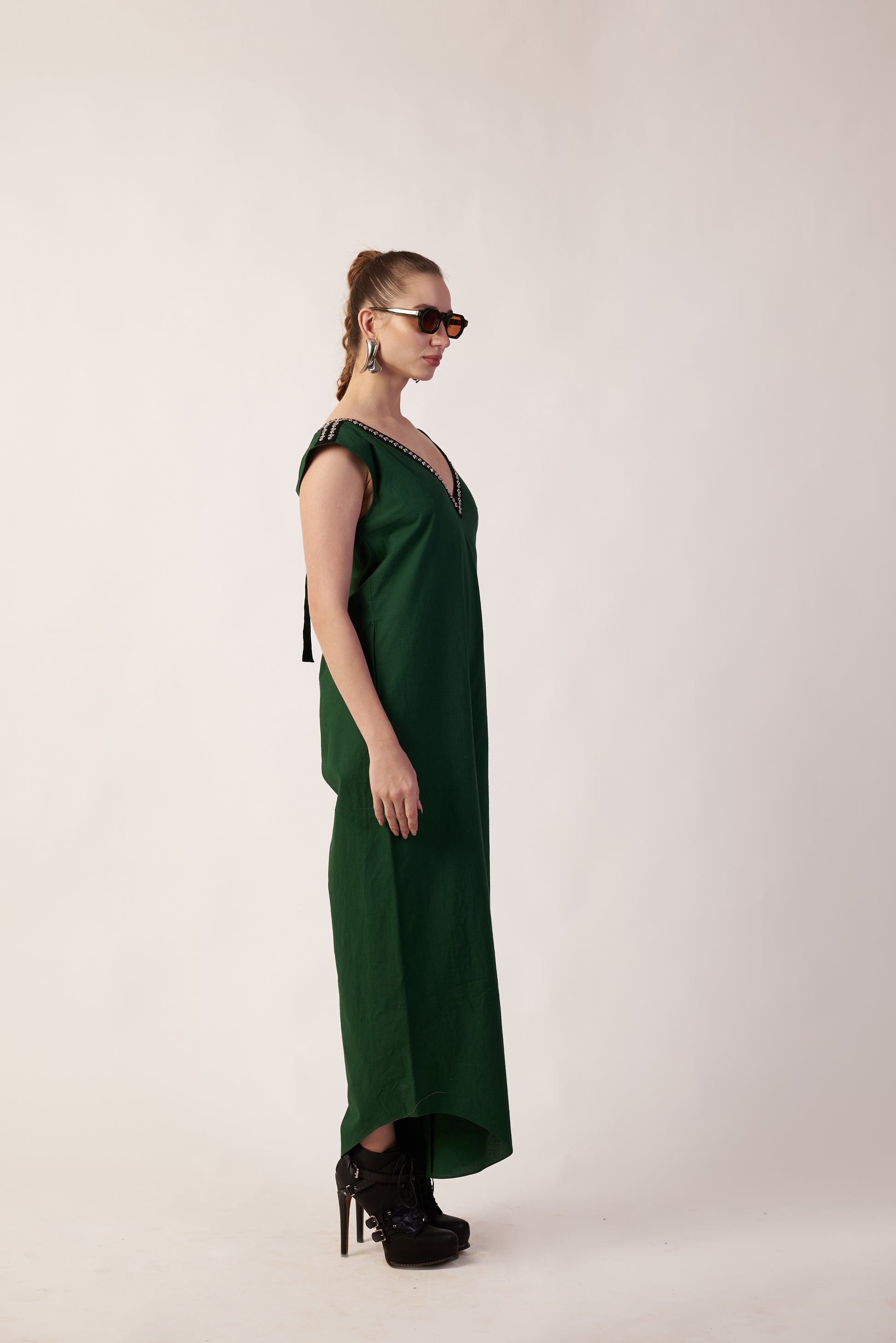 Woman wearing a green dress  | Women Jumpsuit | Pret Clothes | nEo Clothes.