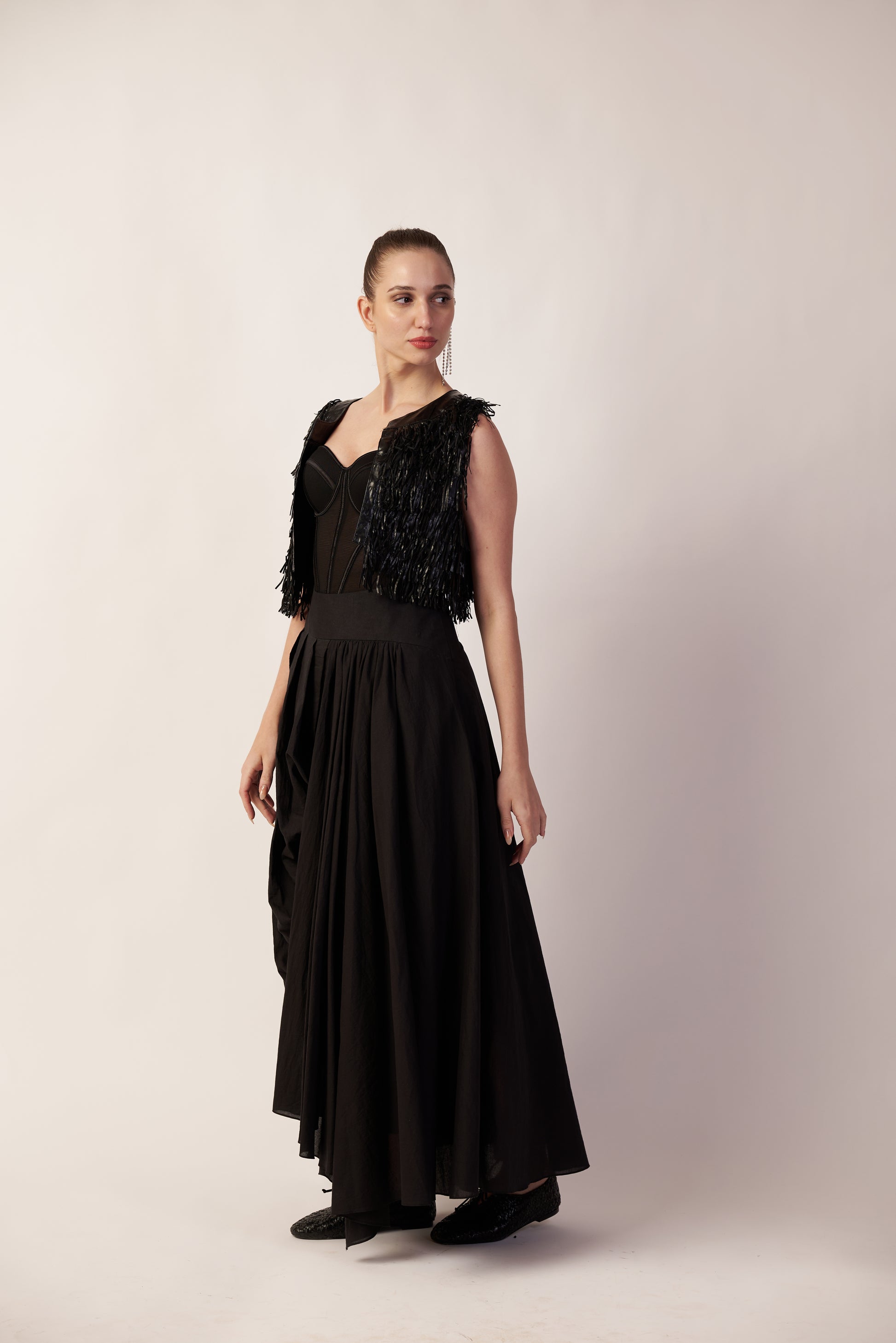 Woman wearing a black pant with intricate detailing  | Women's Pants | Bottoms | Pret Clothes | nEo Clothes.