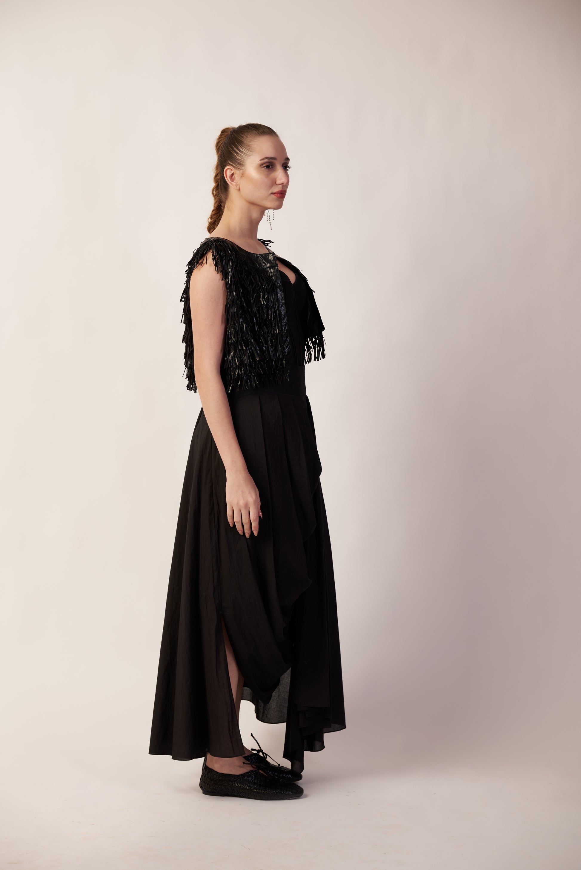 Woman wearing a black pant with fringe details  | Women's Pants | Bottoms | Pret Clothes | nEo Clothes.