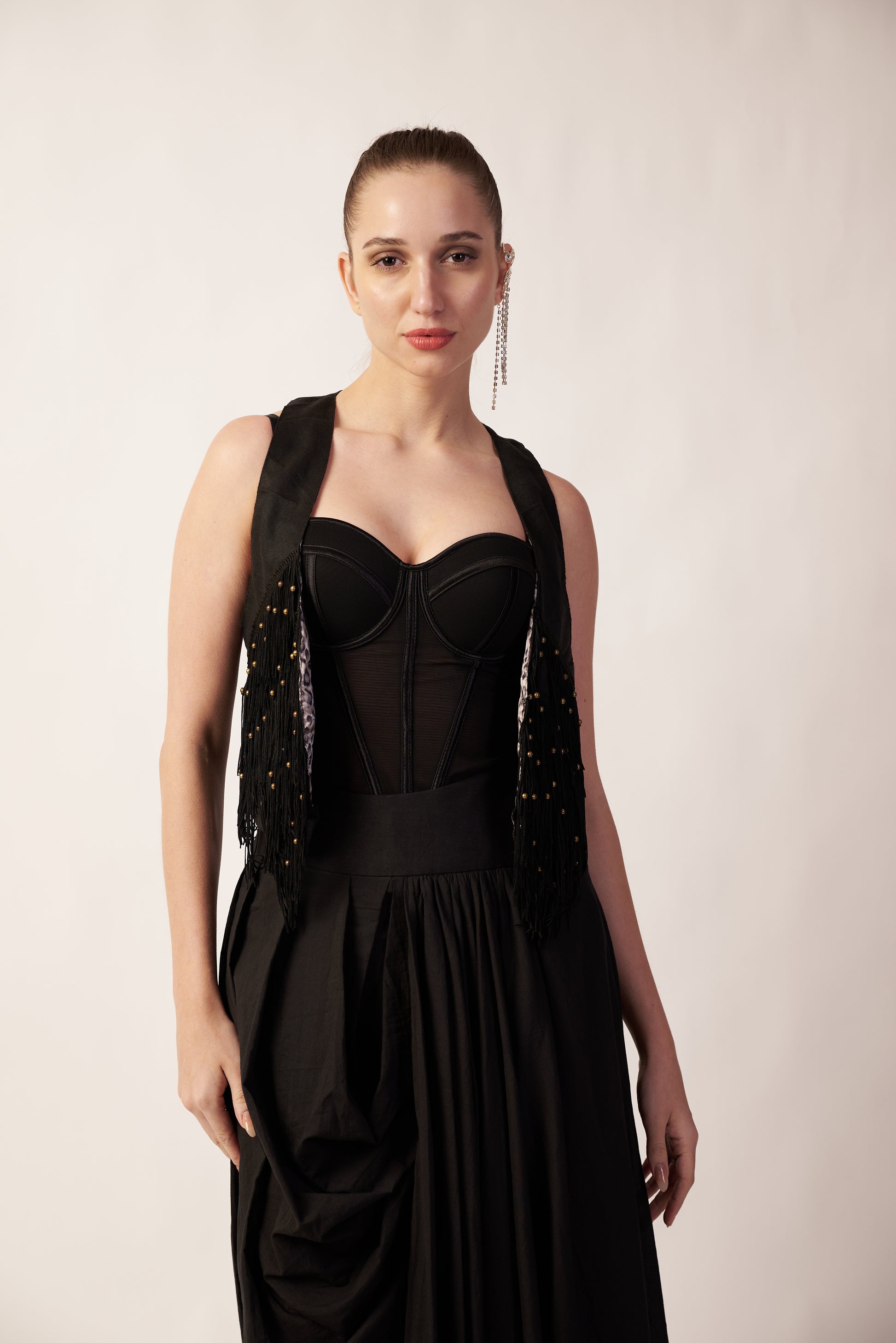 Woman wearing a black dress with a beaded vest  | Women's Overlay & Camisole | Jacket | Pret Clothes | nEo Clothes.