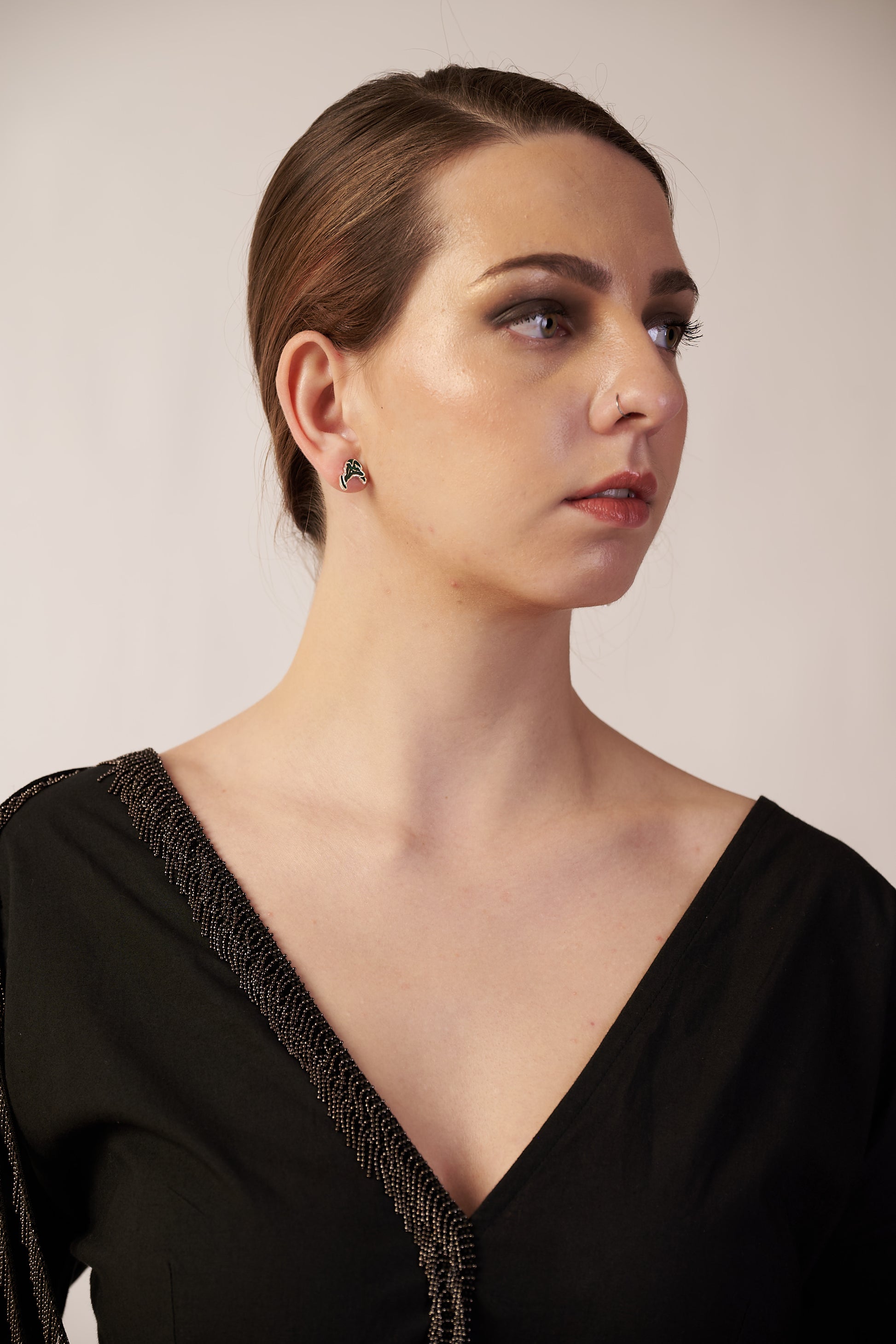 Woman wearing a Ear Cuffs with black dress | Statement Ear Cuffs | neo jewelry