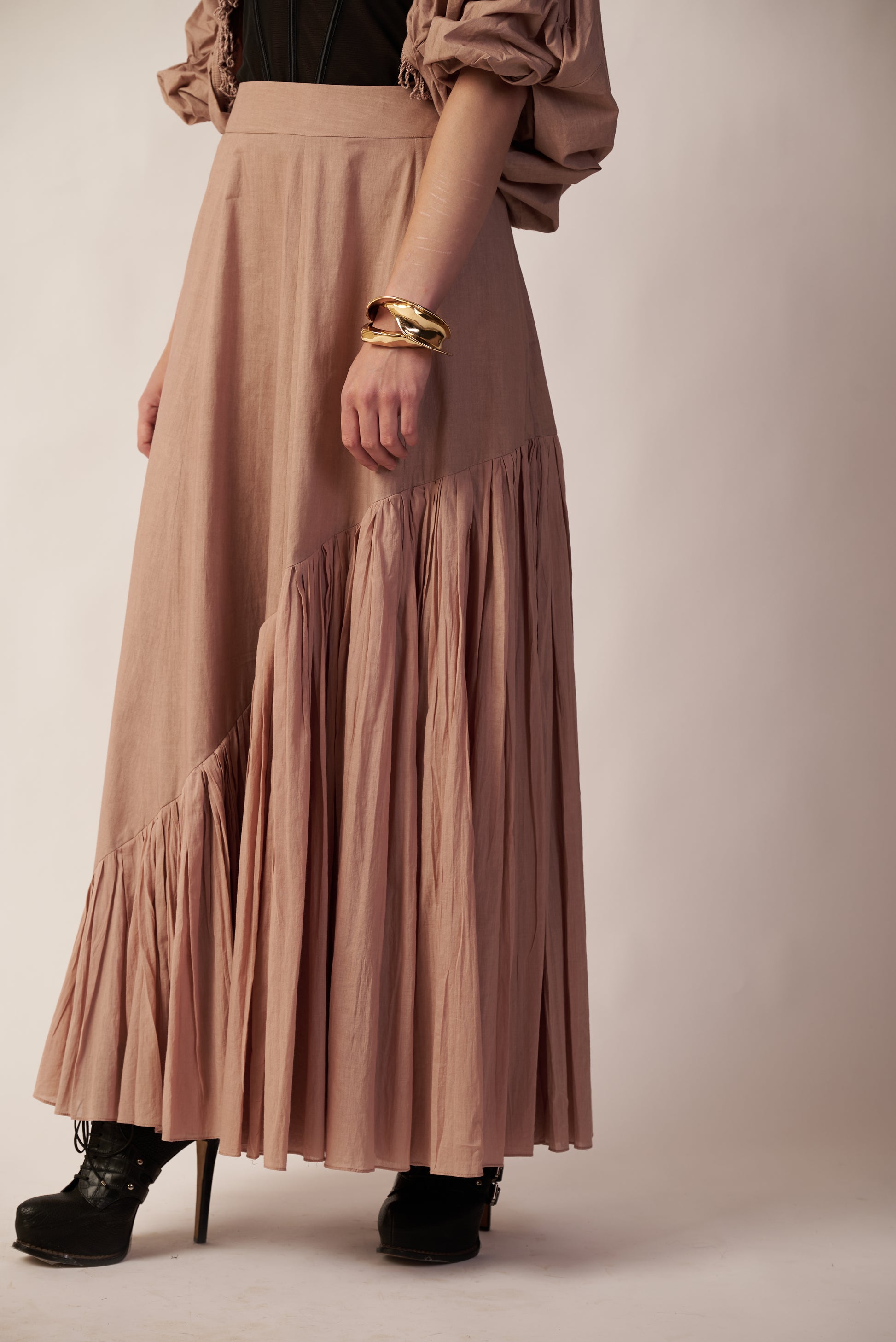 Person wearing a long beige skirt  | Women's Skirt | Bottoms | Pret Clothes | nEo Clothes.