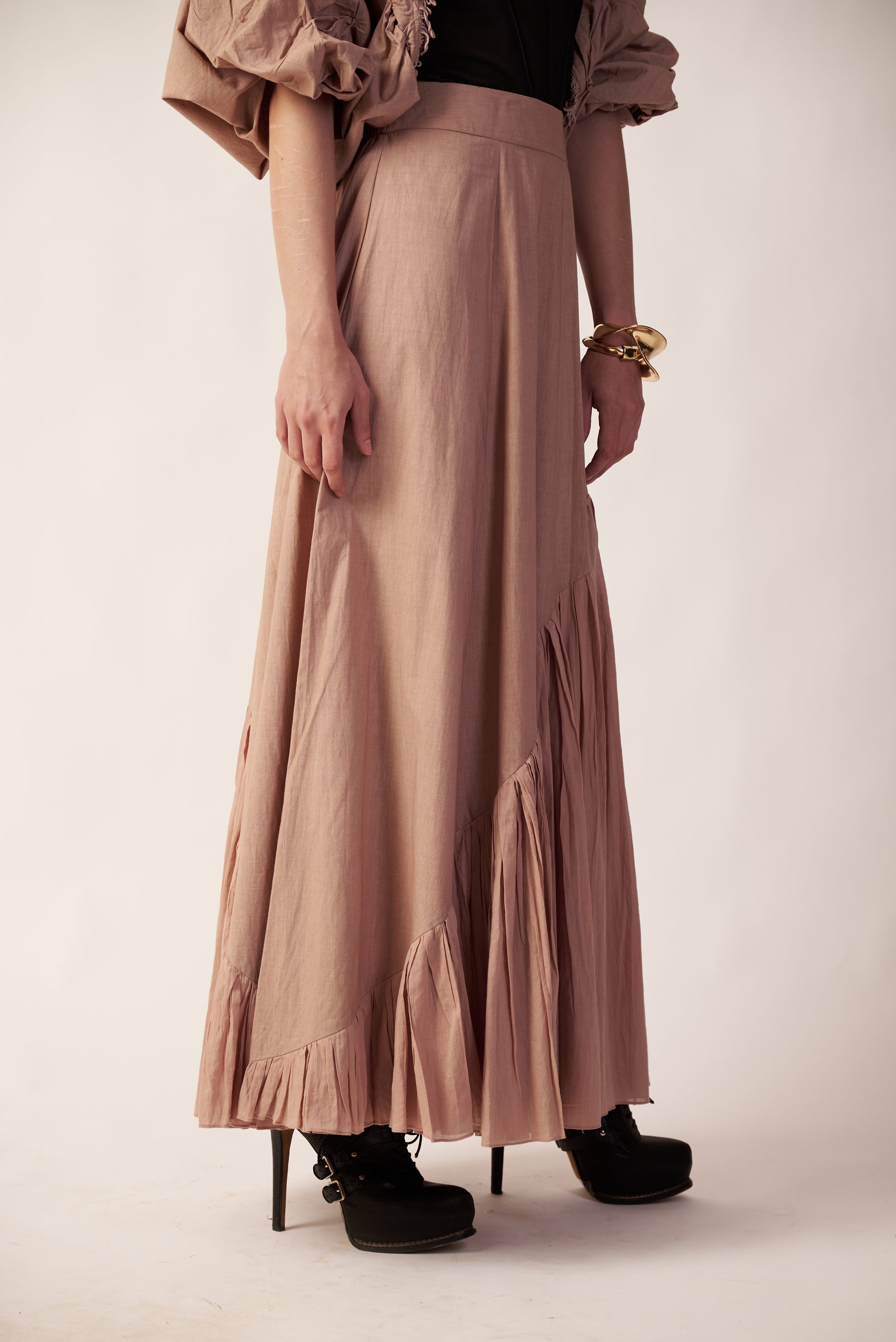 Person wearing a long beige skirt  | Women's Skirt | Bottoms | Pret Clothes | nEo Clothes.