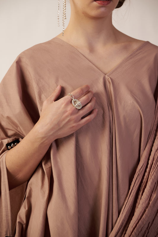 Person wearing a silver rings with beige dress | Statement Ring  | neo jewelry 