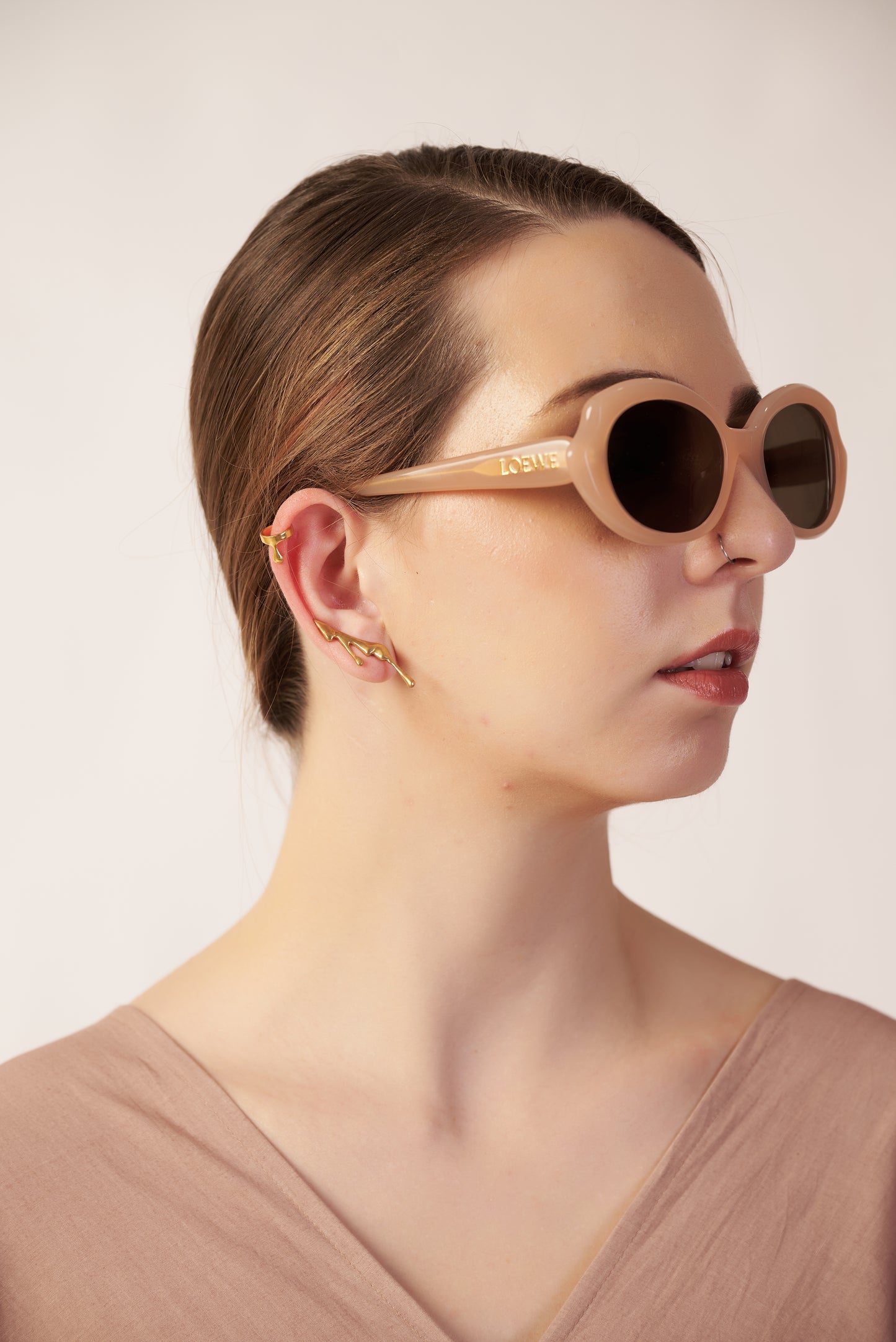 Woman wearing Gold Drip Earrings Melton metal design with Ear Cuffs | Statement Earrings | neo jewelry 