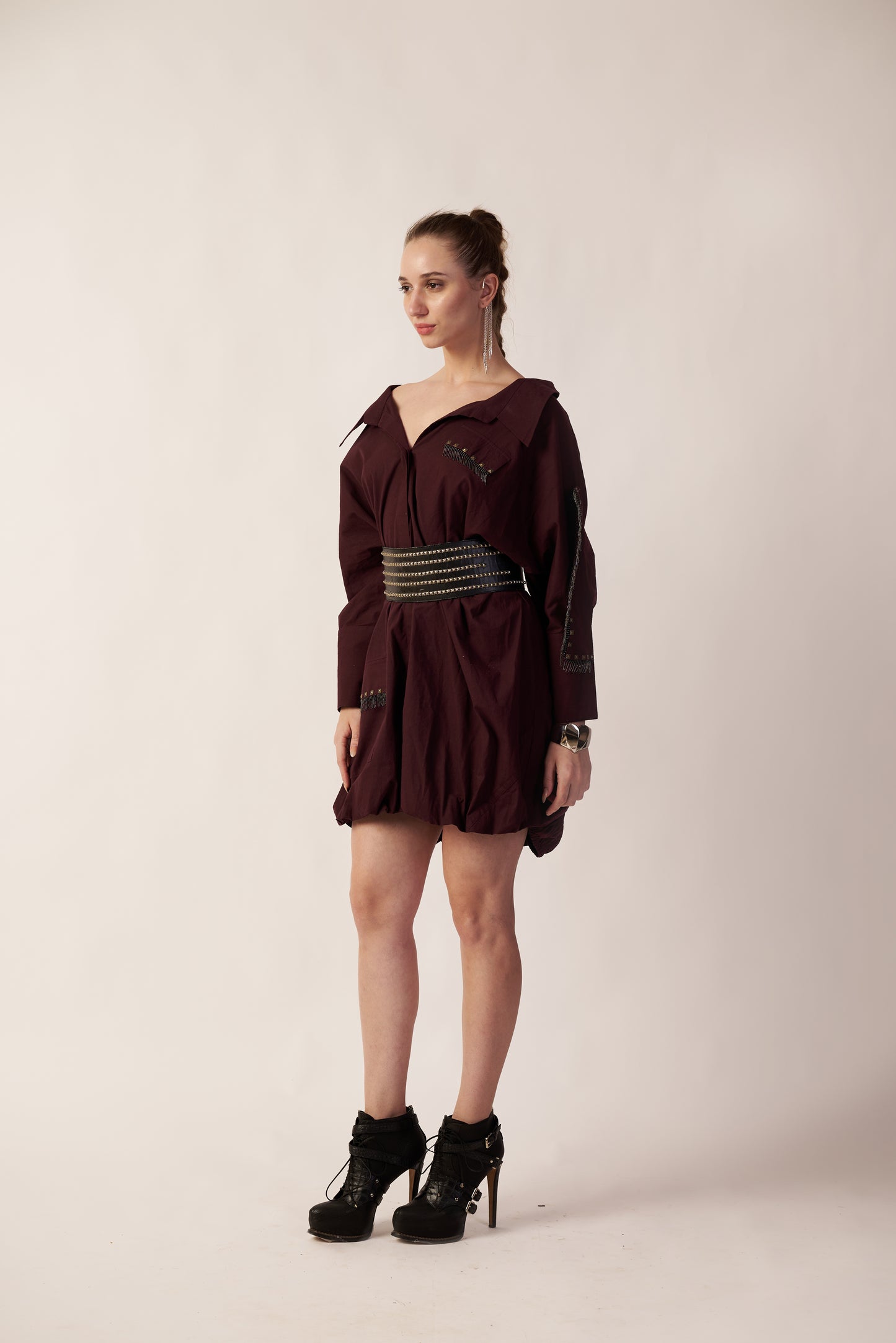 Woman wearing a Coca cola dress with a belt and black high-heeled shoes | Women Dresses | Pret Clothes | nEo Clothes.