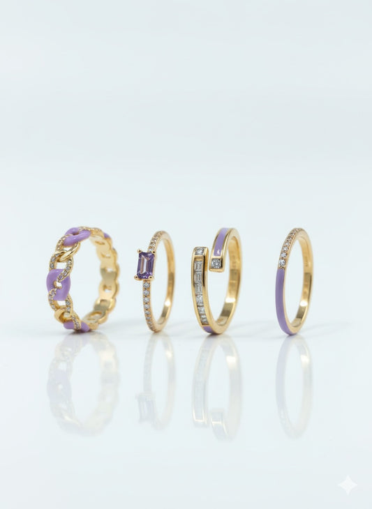 Set of four gold and lavender enamel rings with mixed textures and crystal detailing – stackable designer rings by Near Earth Object.