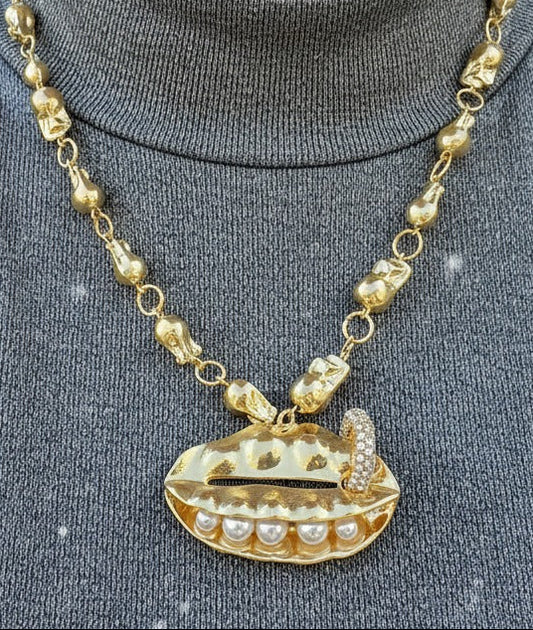 Model wearing gold UFO pendant necklace with crystal detailing – futuristic fashion jewellery by Near Earth Object