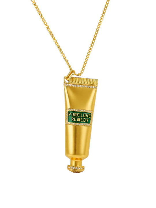 Gold tube-shaped pendant with 'PURE LOVE REMEDY'  | Statement Necklace & Chokers  | neo jewelry 