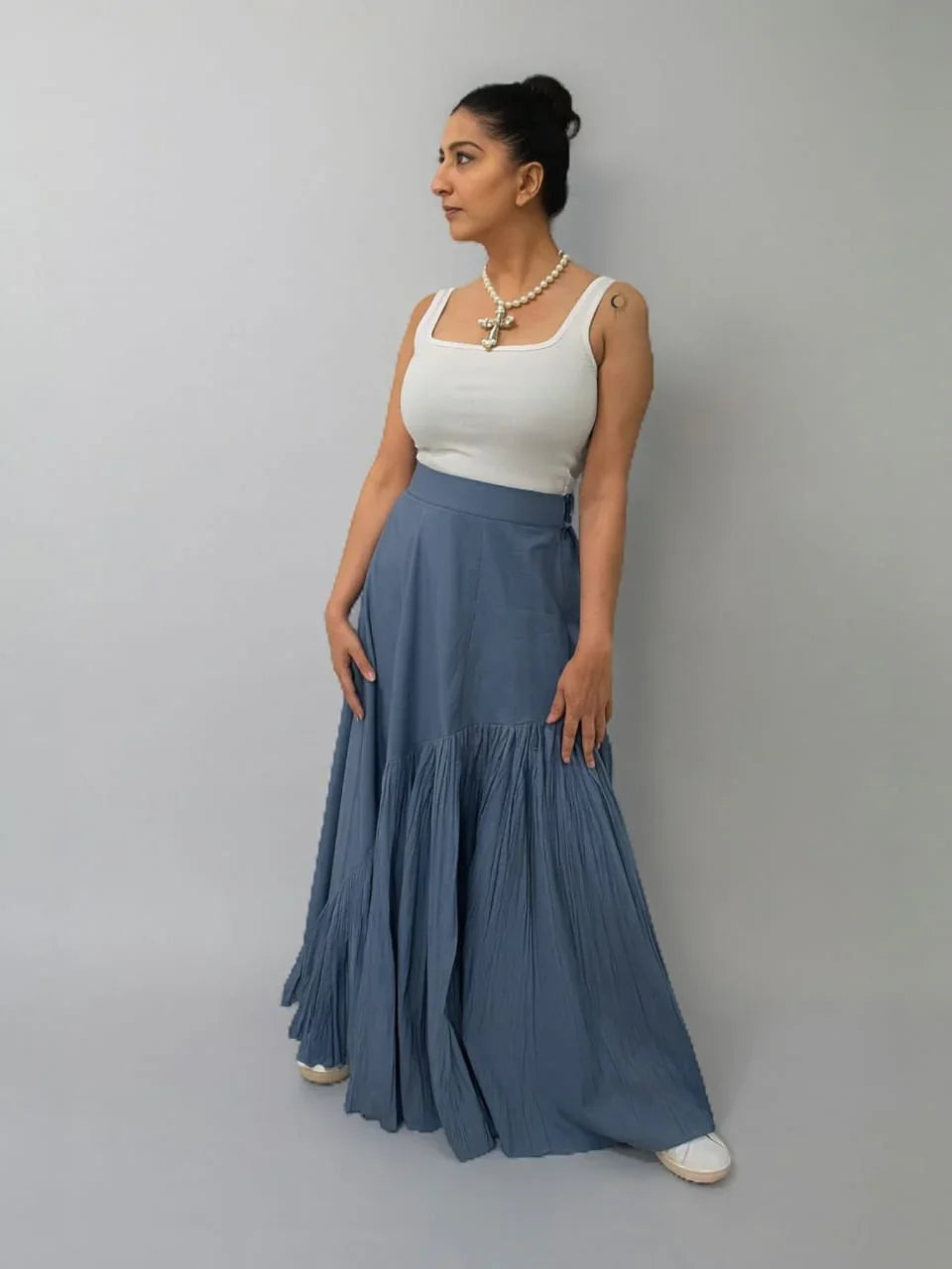Woman wearing a white top and blue skirt  | Women's Skirt | Bottoms | Pret Clothes | nEo Clothes.