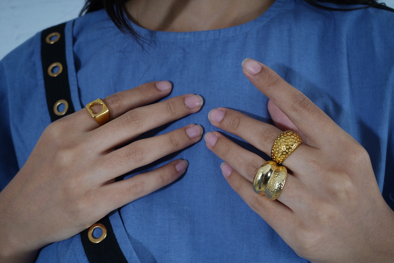 Person wearing gold rings | Statement Ring | Asymmetrical Ring  | neo jewelry 
