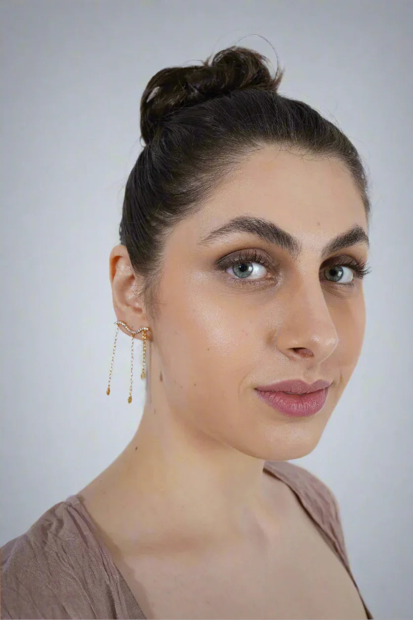 Woman with styled hair and earrings | Statement Earrings | neo jewelry