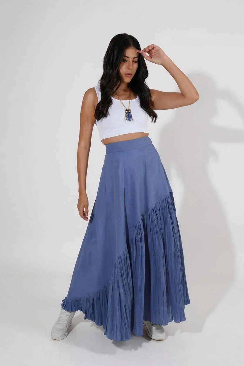 Woman wearing a white top and blue fringed skirt  | Women's Skirt | Bottoms | Pret Clothes | nEo Clothes.
