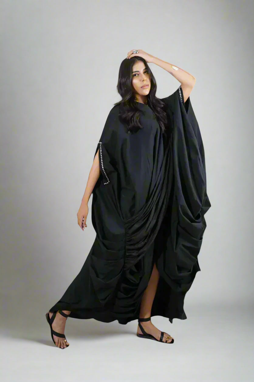 Woman wearing a black draped dress | Women Dresses | Pret Clothes | nEo Clothes